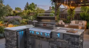 High-end luxury built-in grill insert featuring backlit LED control knobs for evening BBQ hosting.